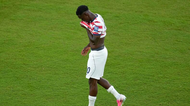 United States' Folarin Balogun (20) reacts to a red card during the World Cup round of 32 soccer match between the United States and Bosnia in Santa Clara, Calif., near San Francisco, Wednesday, July 1, 2026. (AP Photo/Jeff Chiu)