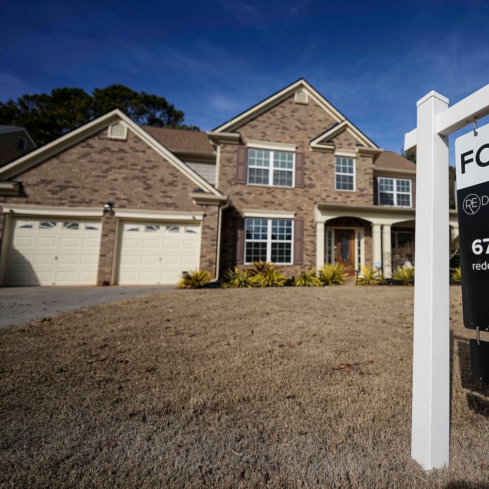 A sign announcing a home for sale is posted outside a home Feb. 1, 2024, in Acworth. Metro Atlanta saw a 4% decrease in April home sales compared to April 2024. (Mike Stewart/AP 2024)