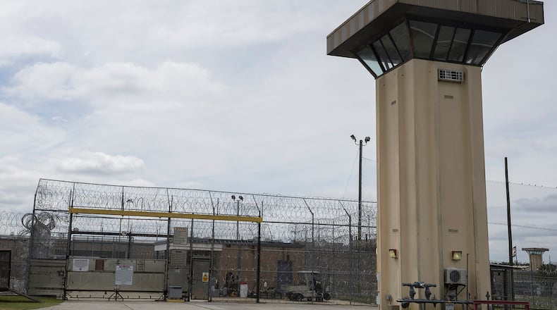 Razor wire and guard towers on Sept. 28. 2023, at the Ware State Prison in Waycross, Georgia. (Stephen B. Morton/The Atlanta Journal-Constitution)