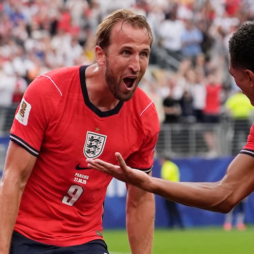 England's Harry Kane (9) celebrates with England's Jude Bellingham (10) after scoring their second goal during the World Cup Group L soccer match between Panama and England in East Rutherford, N.J., near New York, Saturday, June 27, 2026. (AP Photo/Steve Luciano)