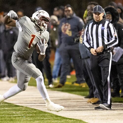Creekside running back Gary Walker makes a catch during the first half of the class 4A semifinal against Kell at Creekside High School on Friday. (Oscar Guevara Saenz for the AJC)