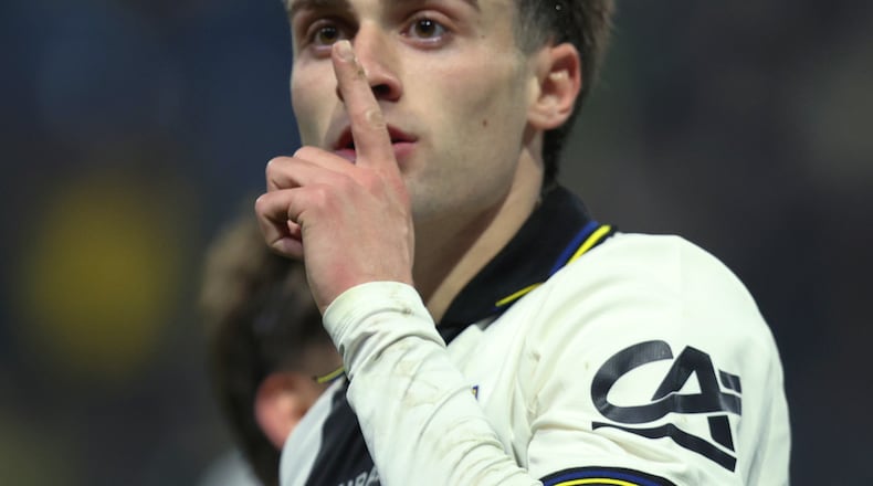 Parma's Gaetano Pio Oristanio reacts after scoring a goal during the Italian Serie A soccer match between Parma and Cagliari in Parma, Italy, Friday, Feb. 27, 2026. (Gianni Santandrea/LaPresse via AP)