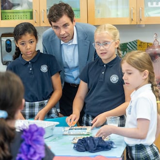 Colin Creel, headmaster of Cornerstone Christian Academy in Peachtree Corners, checks in with students. Creel has overseen the school’s steady growth and deepening culture for more than a decade. (Phil Skinner for the AJC)