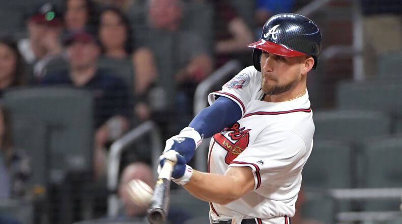 The Braves’ Ender Inciarte hits SunTrust Park’s first home run in the sixth inning of Friday’s game against the Padres. HYOSUB SHIN / HSHIN@AJC.COM