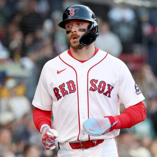 Boston Red Sox's Trevor Story runs to the dug out after scoring during the second inning of a baseball game against the New York Yankees, Thursday, April 23, 2026, in Boston. (AP Photo/Mark Stockwell)