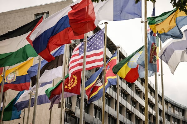 The U.S flag flies among others at the UNESCO headquarters Tuesday, July 22, 2025 in Paris. (AP Photo/Thomas Padilla)