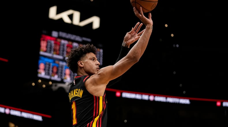 Atlanta Hawks forward Jalen Johnson (1) scores in the first half of an NBA basketball game against the New York Knicks, Wednesday, Nov. 15, 2023, in Atlanta. (AP Photo/Brynn Anderson)