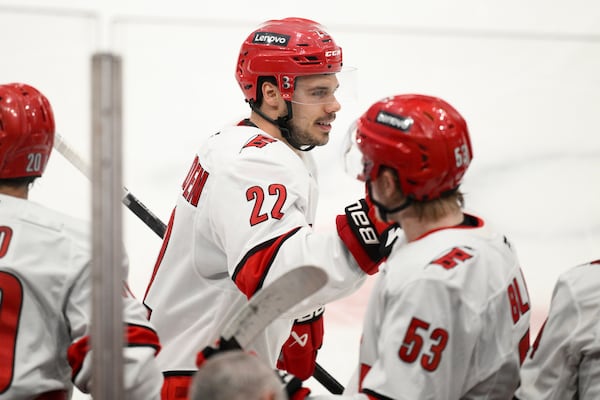 Carolina Hurricanes center Logan Stankoven (22) celebrates his goal in the third period of Game 1 of a second-round NHL hockey playoff series against the Washington Capitals Tuesday, May 6, 2025, in Washington. (AP Photo/Nick Wass)
