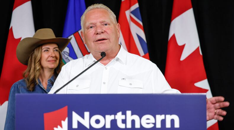 Ontario Premier Doug Ford and Alberta Premier Danielle Smith, left, announce the Northern Shield pipeline proposal in Calgary, Canada, Monday, July 6, 2026. (Jeff McIntosh/The Canadian Press via AP)
