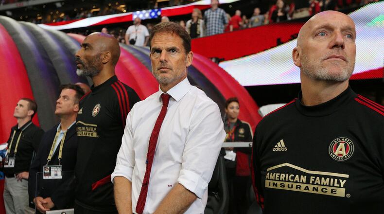 May 12, 2019 Atlanta: Atlanta United head coach Frank de Boer (center) and assistant coaches take the bench for the game against Orlando City in a MLS soccer match on Sunday, May 12, 2019, in Atlanta.  Curtis Compton/ccompton@ajc.com