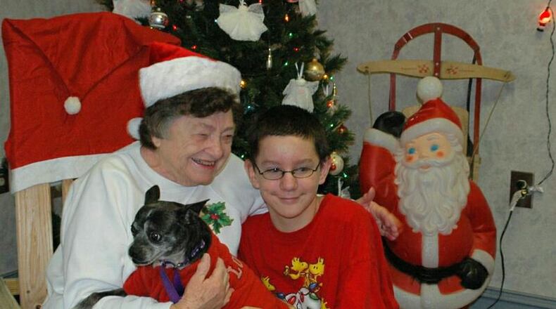 Thirteen-year-old Dakota Allen and canine friend Jules visit with Martha Jean Barnette at the Barrow County Senior Citizens Center in Winder. CONTRIBUTED