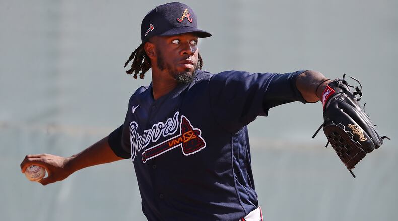 Braves' Touki Toussaint delivers a pitch on Feb. 16, 2020. Curtis Compton / AJC