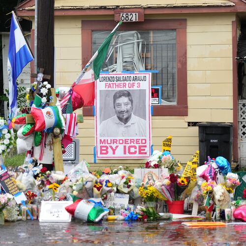 A growing memorial at the site where Lorenzo Salgado Araujo was fatally shot by ICE agents last week, is seen Monday, July 13, 2026, in Houston. (AP Photo/Karen Warren)