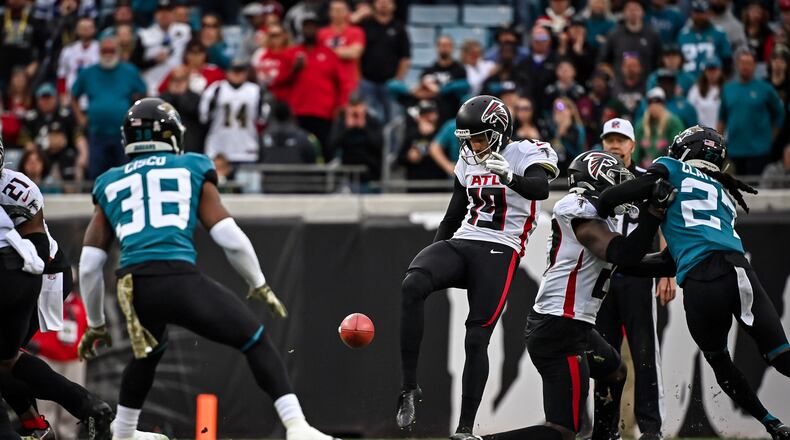 Falcons punter Thomas Morstead #19 punts during the second half against the Jacksonville Jaguars at TIAA Bank Field in Jacksonville, Florida on Sunday, November 28, 2021. (Photo by Dakota Williams/Atlanta Falcons)