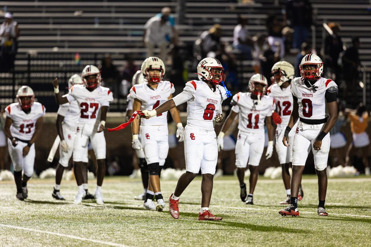 Sandy Creek linebacker Elijah Ware (6) and teammates celebrates their victory over Douglas County at Douglas County High School in Douglasville, GA on Friday, August 28, 2026. (Oscar Guevara Saenz for the AJC)