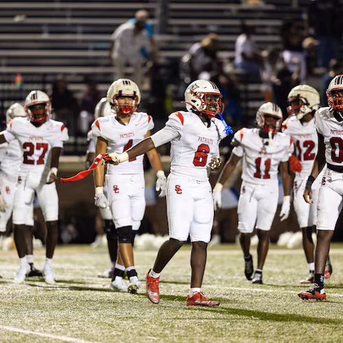 Sandy Creek linebacker Elijah Ware (front) and teammates celebrate their victory over Douglas County on Friday, Aug. 28, 2026, at Douglas County High School. (Oscar Guevara Saenz for the AJC)