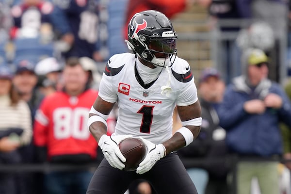 FILE - Houston Texans wide receiver Stefon Diggs warms up before an NFL football game against the New England Patriots, Oct. 13, 2024, in Foxborough, Mass. (AP Photo/Steven Senne, File)