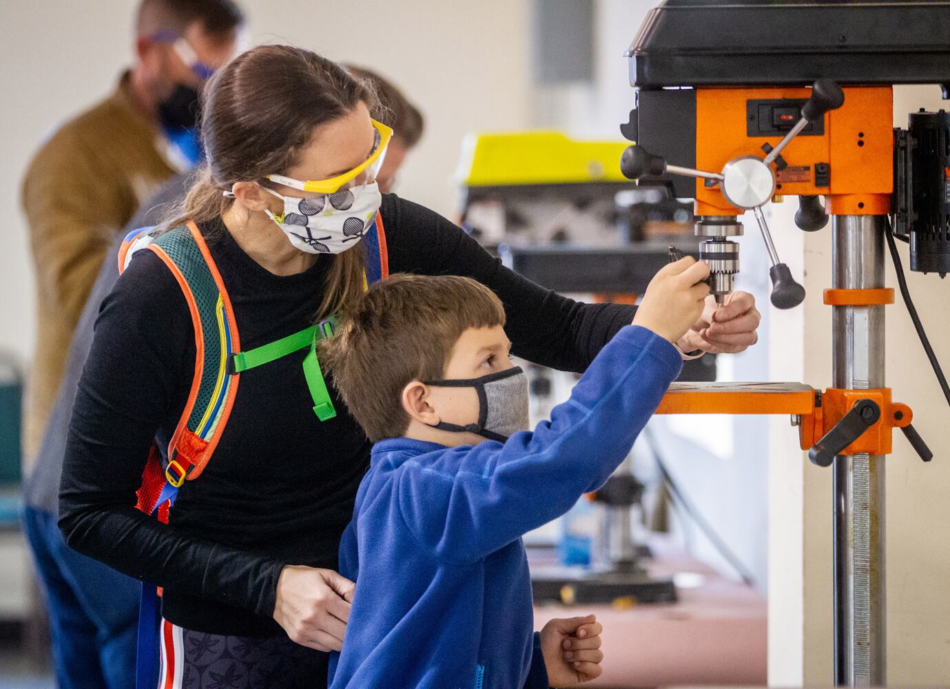 Cub Scouts building pinewood derby cars