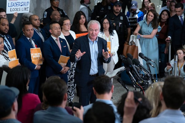 Sen. Chris Van Hollen, D-Md., speaks during a news conference upon his arrival from meeting with Kilmar Abrego Garcia in El Salvador, at Washington Dulles International Airport, in Chantilly, Va., Friday, April 18, 2025. (AP Photo/Jose Luis Magana)