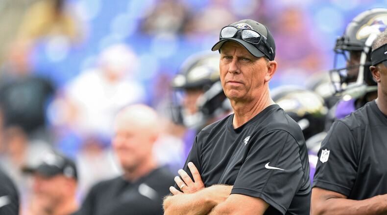 After the Ravens missed out on the playoffs with a loss to the Steelers on Sunday, head coach John Harbaugh (and offensive coordinator Todd Monken (center) — pictured during a 2022 preseason game — could be out of a job in Baltimore. That would make them possible hires for the Falcons' vacant head coaching position. (Terrance Williams/AP 2022)