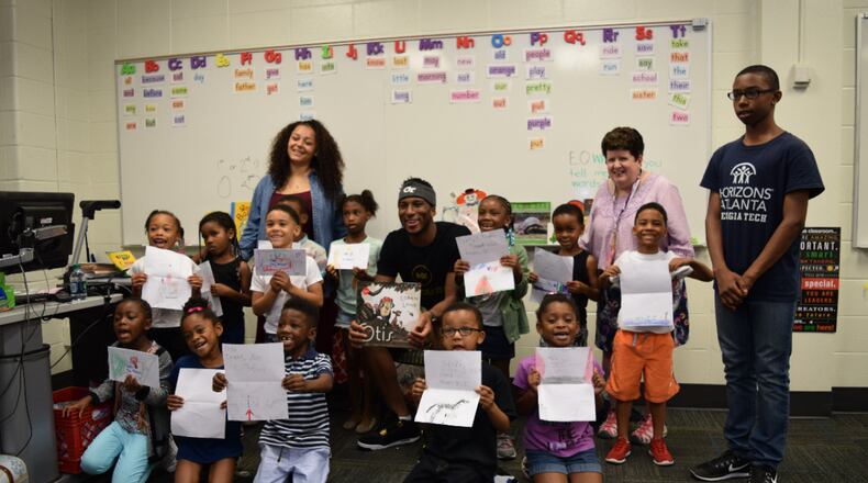 Georgia Tech guard Josh Okogie reads to kids who attend the Horizons Atlanta summer learning program that supports students from underserved communities throughout their K–12 academic careers.
