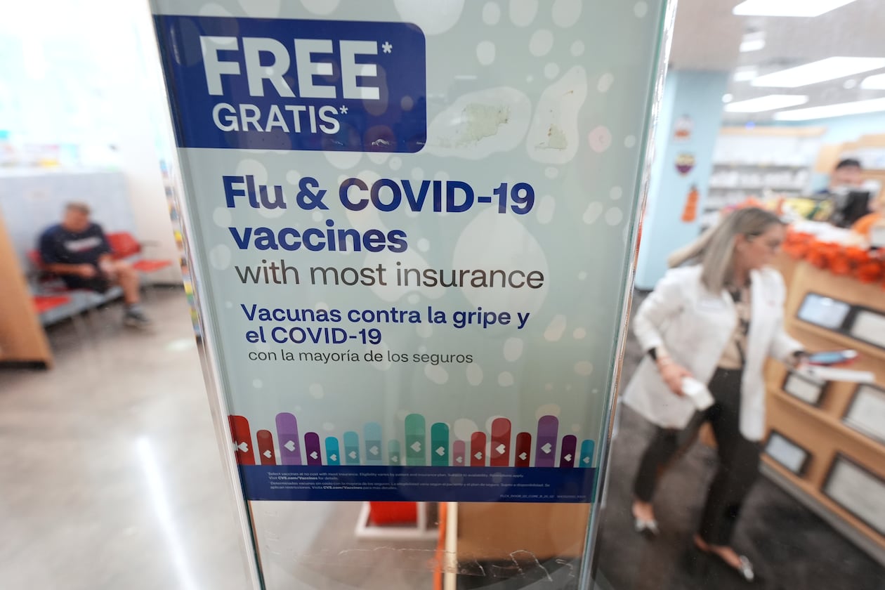 A sign advertises seasonal flu and COVID-19 vaccines at a CVS Pharmacy in Miami, Tuesday, Sept. 9, 2025. (Rebecca Blackwell/AP)