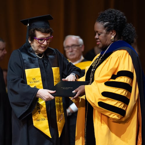 Tennis legend Billie Jean King, left, receives her diploma from California State University, Los Angeles, President Berenecea Johnson Eanes during commencement in Los Angeles, Monday, May 18, 2026. (AP Photo/Jae C. Hong)
