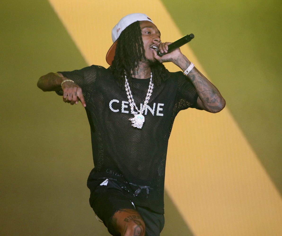 Wiz Khalifa performs as Snoop Dogg brought his High School Reunion Tour to Lakewood Amphitheatre on Wednesday, August 9, 2023. Additional acts included Wiz Khalifa, Too $hort, Warren G, Berner and DJ Drama. Robb Cohen for the Atlanta Journal-Constitution