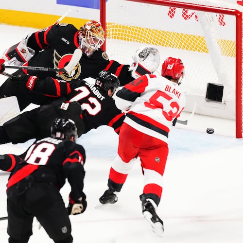 Carolina Hurricanes' Jackson Blake (53) scores on Ottawa Senators goaltender Linus Ullmark (35) as Senator's Thomas Chabot (72) defends during the second period of an NHL hockey playoff game in Ottawa, Ontario, Thursday, April 23, 2026. (Sean Kilpatrick/The Canadian Press via AP)
