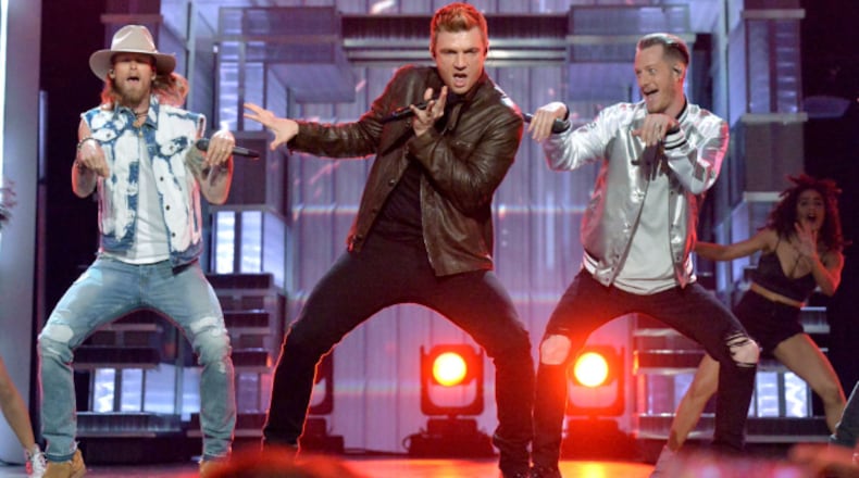 LAS VEGAS, NV - APRIL 02: (L-R) Musicians Brian Kelley of Florida Georgia Line, Nick Carter of The Backstreet Boys, and Tyler Hubbard of Florida Georgia Line perform onstage at the 52nd Academy Of Country Music Awards at T-Mobile Arena on April 2, 2017 in Las Vegas, Nevada. (Photo by Jeff Kravitz/ACMA2017/FilmMagic for ACM)