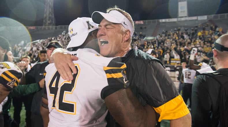 MOBILE, AL - DECEMBER 23: Defensive coordinator Nate Woody of the Appalachian State Mountaineers celebrates with defensive lineman Tee Sims #42 of the Appalachian State Mountaineers after defeating the Toledo Rockets on December 23, 2017 at Ladd-Peebles Stadium in Mobile, Alabama. (Photo by Michael Chang/Getty Images)