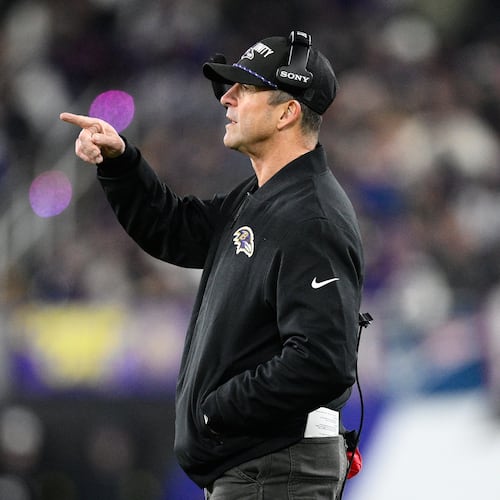 Baltimore Ravens head coach John Harbaugh gestures during the first half of an NFL football game against the New England Patriots, Sunday, Dec. 21, 2025, in Baltimore. (AP Photo/Nick Wass)