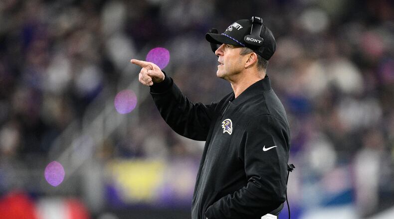 Baltimore Ravens head coach John Harbaugh gestures during the first half of an NFL football game against the New England Patriots, Sunday, Dec. 21, 2025, in Baltimore. (AP Photo/Nick Wass)