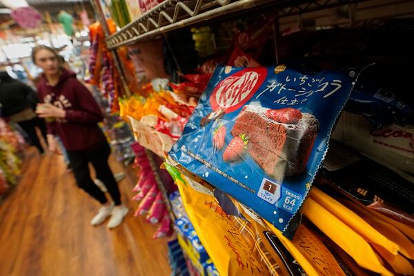 Kit Kats from Japan are displayed for sale at Economy Candy in New York's Lower East Side, Friday, April 4, 2025. (AP Photo/Richard Drew)
