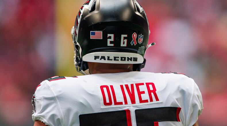 A 9/11 ribbon decal is worn on the helmet of Falcons cornerback Isaiah Oliver (26) during the first half  against the Philadelphia Eagles, Sunday, Sep. 12, 2021, in Atlanta. (Danny Karnik/AP)