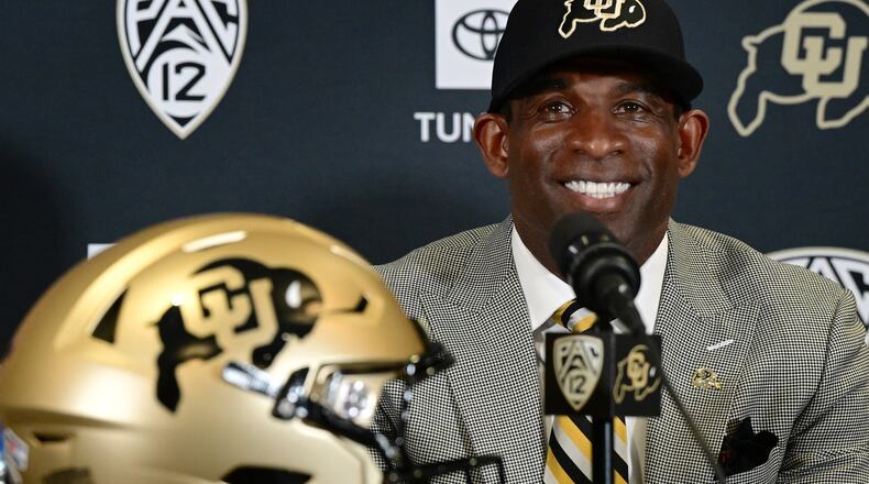 Deion Sanders, Colorado's new head football coach, takes questions in the Arrow Touchdown Club during a press conference on Dec. 4, 2022, in Boulder, Colorado. (Helen H. Richardson/The Denver Post/TNS)