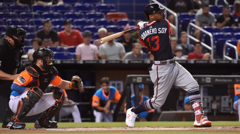 Ronald Acuna Jr.  of the Atlanta Braves singles in the first inning against the Miami Marlins at Marlins Park on August 26, 2018 in Miami, Florida. All players across MLB will wear nicknames on their backs as well as colorful, non-traditional uniforms featuring alternate designs inspired by youth-league uniforms during Players Weekend. (Photo by Eric Espada/Getty Images)
