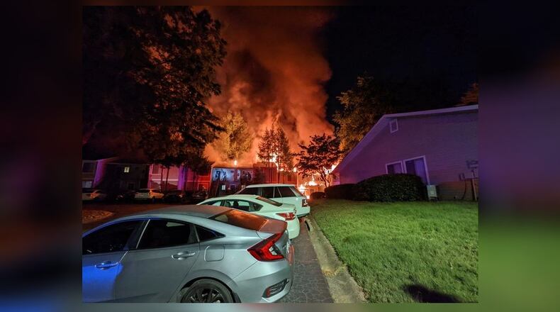 Residents from 12 units were displaced when flames engulfed an apartment complex in Norcross early Friday. No one was injured, fire officials said.
