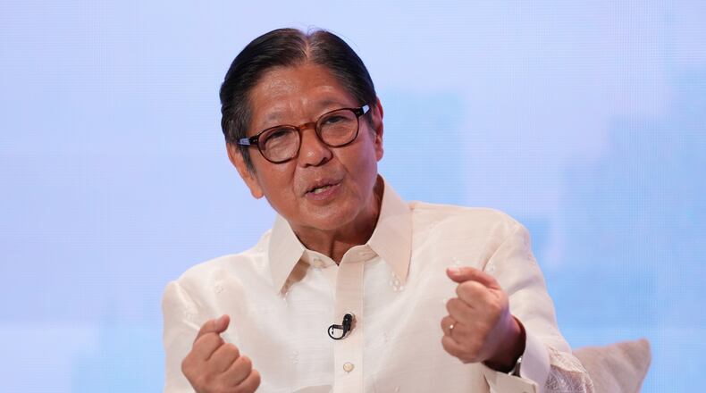 FILE - Philippine President Ferdinand Marcos Jr. gestures as he answers questions at the ASEAN Editors and Economic Opinon Leaders Forum in Makati, Philippines on Tuesday, Feb. 24, 2026. (AP Photo/Aaron Favila, File)