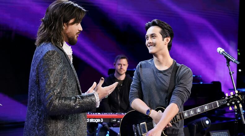 AMERICAN IDOL - "215" - The "American Idol" finalists continue their journey in the competition, paying tribute to one of the world's most iconic bands, Queen. In this episode, each contestant will take on a song from the legendary Queen catalogue, before partnering up for classic movie duet performances. Helping to prepare the Top 8 to rock the stage is "American Idol" alumnus and GRAMMY¨-nominated artist Adam Lambert, who acts as celebrity guest mentor. Since first appearing on "American Idol" in 2009, Lambert has gone on to release four albums, has appeared in numerous hit television series and is currently touring the U.S. with Queen. The journey to find the next superstar continues SUNDAY, APRIL 28 (8:00-10:01 p.m. EDT/5:00-7:01 p.m. PDT), on The ABC Television Network. (ABC/Eric McCandless) ADAM LAMBERT, LAINE HARDY