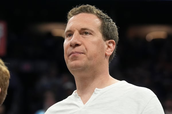 FILE - Phoenix Suns owner Mat Ishbia watches players warm up prior to Game 4 of an NBA basketball first-round playoff series against the Minnesota Timberwolves, April 28, 2024, in Phoenix. (AP Photo/Ross D. Franklin, file)