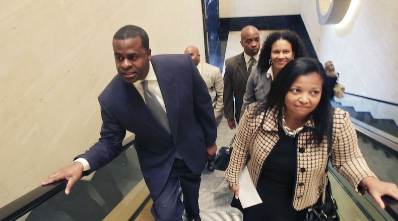 Former Mayor Kasim Reed (left) and city attorney Cathy Hampton represented the city of Atlanta on an economic development trip to South Africa in 2017. BOB ANDRES / BANDRES@AJC.COM