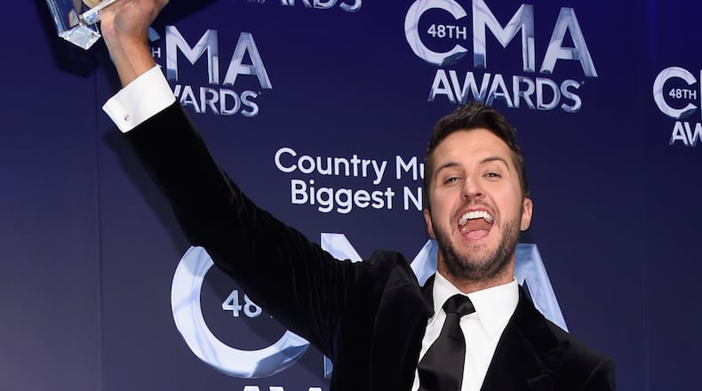 NASHVILLE, TN - NOVEMBER 05: Luke Bryan poses in the press room with his award for Entertainer of the Year during the 48th annual CMA awards at the Bridgestone Arena on November 5, 2014 in Nashville, Tennessee. (Photo by Larry Busacca/Getty Images) Ladies and gentleman, straight out of Leesburg, your entertainer of the year, Luke Bryan! Photo: Getty Images