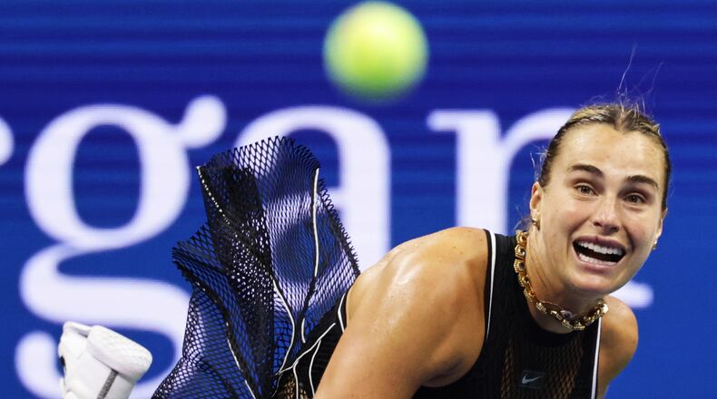 Aryna Sabalenka, of Belarus, serves to Polina Iatcenko, of Russia, during the second round of the U.S. Open tennis championships, Wednesday, Sept. 2, 2026, in New York. (AP Photo/Adam Hunger)