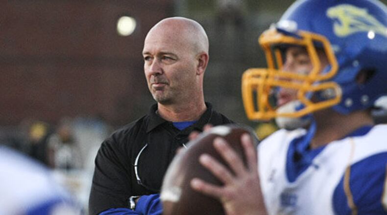 Chattahoochee head coach Terry Crowder studies the action on the field before facing off against the Sequoyah Chiefs. Coach Crowder has switched his offense to a spread and is averaging close to 40 points per game.