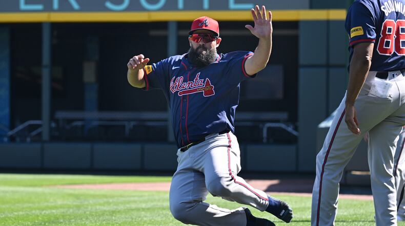 Atlanta Braves infielder Luis Guillorme slides during spring training workouts at CoolToday Park, Friday, Feb. 23, 2024, in North Port, Florida. (Hyosub Shin / Hyosub.Shin@ajc.com)