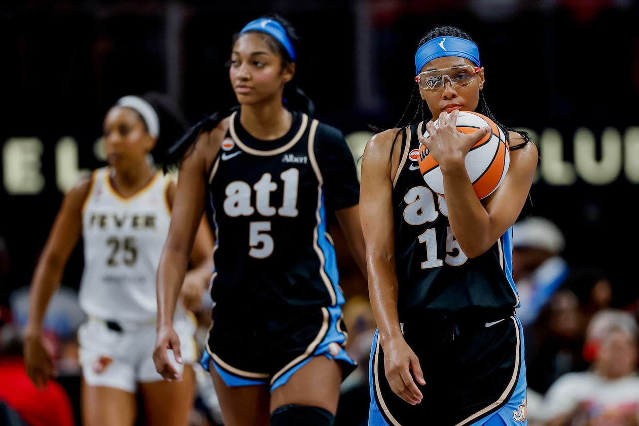 Atlanta Dream guard Allisha Gray (right) and forward Angel Reese react during the second half of a game against the Indiana Fever on Sunday, Aug. 16, 2026 at State Farm Arena in Atlanta. (Erik S. Lesser for the AJC)