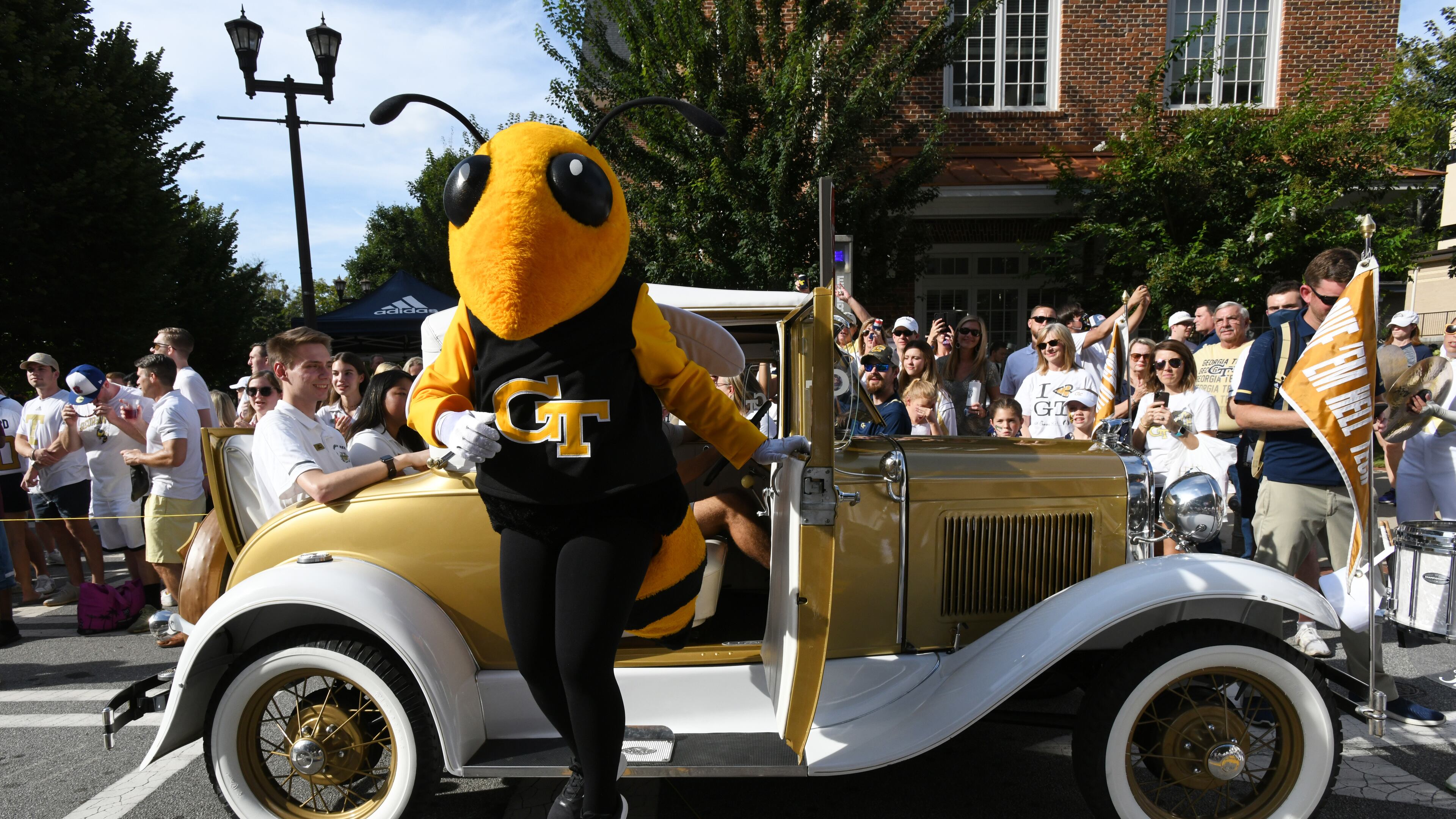 Georgia Tech's mascot, Buzz, jumps off from Ramblin' Wreck outside of Bobby Dodd Stadium in Atlanta on Sept. 4, 2021. (Hyosub Shin/AJC)