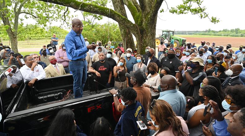 U.S. Sen. Raphael Warnock spoke to Black farmers earlier this month at at Jibb's Vineyard in Byromville, telling them "help is on the way" as part of the $1.9 trillion coronavirus relief package Congress approved earlier this year. (Hyosub Shin / Hyosub.Shin@ajc.com)
