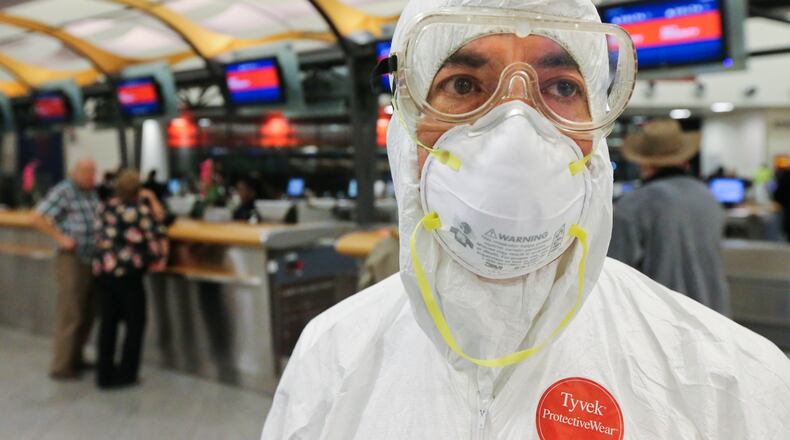 Earlier this month, Dr. Gil Mobley of Springfield, Mo., checked at Hartsfield-Jackson International Airport for a flight in full protective gear to protest what he called mismanagement of the Ebola crisis by the federal Centers for Disease Control and Prevention.